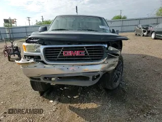 2000 GMC Yukon SLT with VIN 1GKEK13T3YJ202112, listed as a Copart auction lot 71713084 with 303,866 mi miles and Salvage Title. Bid and sale history available at carsss.com. Image 11.