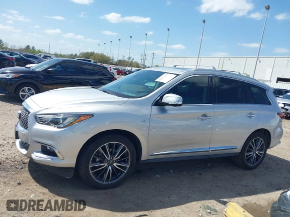 2019 Infiniti QX60 LUXE with VIN 5N1DL0MN8KC526839, listed as a IAAI auction lot 41811271 with 83,729 mi miles. Bid and sale history available at carsss.com. Image 14.