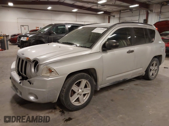 2007 Jeep Compass Sport with VIN 1J8FF47W57D598222, listed as a IAAI auction lot 41379480 with 181,919 mi miles. Bid and sale history available at carsss.com. Image 17.