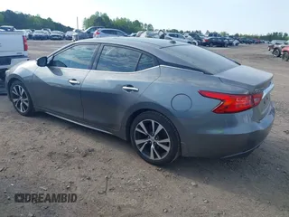 2016 Nissan Maxima SL with VIN 1N4AA6AP8GC430051, listed as a IAAI auction lot 41983059 with 166,786 mi miles and . Bid and sale history available at DreamBid. Image 3.
