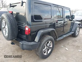 2016 Jeep Wrangler Unlimited 75th Anniversary with VIN 1C4BJWEG1GL221873, listed as a IAAI auction lot 41635788 with 148,493 mi miles. Bid and sale history available at carsss.com. Image 4.