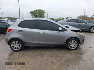 2013 Mazda Mazda2 Sport with VIN JM1DE1KY6D0170767, listed as a IAAI auction lot 41761689 with 142,743 mi miles. Bid and sale history available at carsss.com. Image 13.