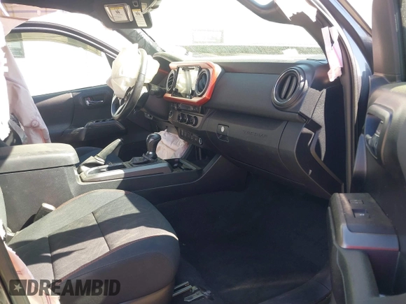 2017 Toyota Tacoma SR5 with VIN 5TFAZ5CN7HX033594, listed as a IAAI auction lot 41881117 with 86,676 mi miles and . Bid and sale history available at DreamBid. Image 5.