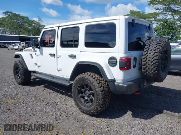 2022 Jeep Wrangler Unlimited Rubicon with VIN 1C4HJXFG8NW130156, listed as a IAAI auction lot 42004630 with 129,313 mi miles and . Bid and sale history available at DreamBid. Image 3.