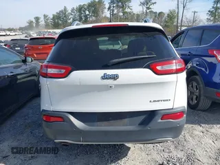 2015 Jeep Cherokee Limited with VIN 1C4PJLDB9FW677367, listed as a IAAI auction lot 41826477 with 125,648 mi miles and . Bid and sale history available at DreamBid. Image 16.