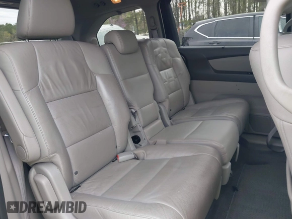 2012 Honda Odyssey Touring with VIN 5FNRL5H98CB026754, listed as a IAAI auction lot 41935562 with 165,626 mi miles. Bid and sale history available at carsss.com. Image 8.
