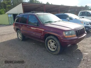 1999 Jeep Grand Cherokee Limited with VIN 1J4GW68N8XC595697, listed as a IAAI auction lot 41917466 with 177,944 mi miles. Bid and sale history available at carsss.com. Image 1.