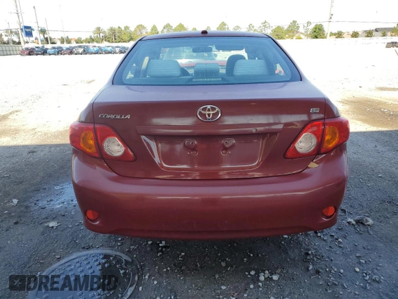 2009 Toyota Corolla with VIN JTDBL40E999074612, listed as a Copart auction lot 53044815 with 128,269 mi miles and Salvage Title. Bid and sale history available at carsss.com. Image 6.