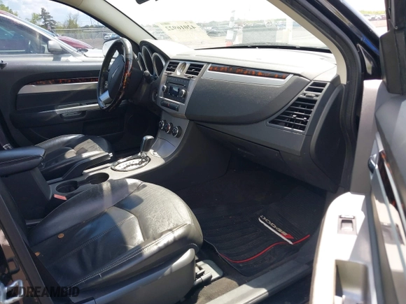 2010 Chrysler Sebring Limited with VIN 1C3CC5FB9AN147436, listed as a IAAI auction lot 42016922 with 161,339 mi miles. Bid and sale history available at carsss.com. Image 5.