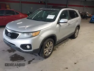 2011 Kia Sorento EX with VIN 5XYKUDA21BG024857, listed as a IAAI auction lot 42243340 with 145,514 mi miles and . Bid and sale history available at DreamBid. Image 2.