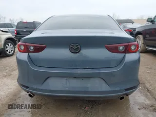2022 Mazda 3 Carbon Edition z VIN 3MZBPACL2NM310491, wystawiony jako IAAI lot #41981966 z przebiegiem 50 314 mil mil oraz . Historia ofert i sprzedaży dostępna na DreamBid. Obrazek 17.