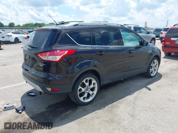 2013 Ford Escape Titanium with VIN 1FMCU9J90DUA01551, listed as a IAAI auction lot 42686247 with 190,707 mi miles and . Bid and sale history available at DreamBid. Image 4.