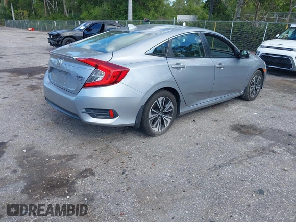 2017 Honda Civic EX-T with VIN 19XFC1F39HE001756, listed as a IAAI auction lot 42030331 with 44,056 mi miles. Bid and sale history available at carsss.com. Image 4.