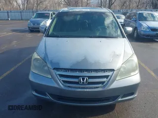 2006 Honda Odyssey EX-L with VIN 5FNRL386X6B018587, listed as a IAAI auction lot 41725966 with 168,215 mi miles. Bid and sale history available at carsss.com. Image 6.