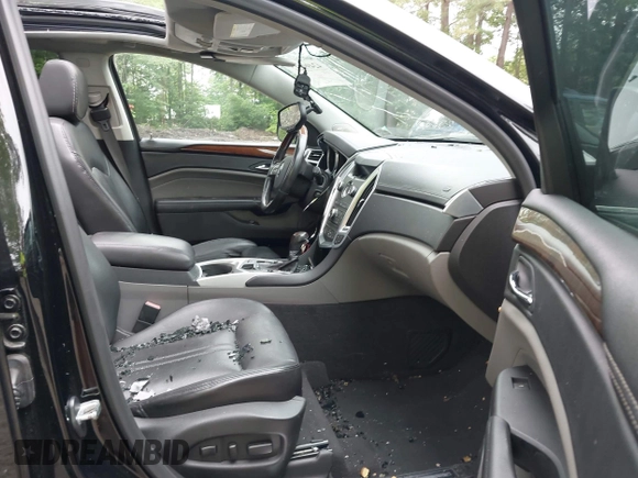 2011 Cadillac SRX Premium Collection with VIN 3GYFNCEY3BS673043, listed as a IAAI auction lot 42499237 with 174,132 mi miles and . Bid and sale history available at DreamBid. Image 5.