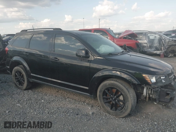 2019 Dodge Journey SE with VIN 3C4PDCBB8KT863492, listed as a IAAI auction lot 40446598 with Not provided miles and . Bid and sale history available at DreamBid. Image 12.