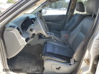 2007 Jeep Grand Cherokee Laredo with VIN 1J8GS48K07C595200, listed as a Copart auction lot 53964155 with 240,392 mi miles and Clean Title. Bid and sale history available at carsss.com. Image 7.