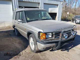 2000 Land Rover Discovery Cloth z VIN SALTY1247YA249969, wystawiony jako IAAI lot #41035905 z przebiegiem 188 643 mil mil oraz . Historia ofert i sprzedaży dostępna na DreamBid. Obrazek 1.