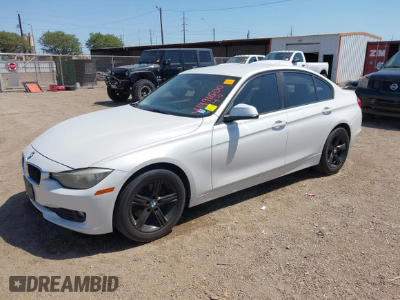 2014 BMW 3 Series 320i with VIN WBA3B1C53EP680072, listed as a IAAI auction lot 41996500 with 192,948 mi miles. Bid and sale history available at carsss.com. Image 2.