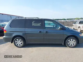 2003 Honda Odyssey EX with VIN 5FNRL18673B112958, listed as a IAAI auction lot 42172282 with 189,521 mi miles and . Bid and sale history available at DreamBid. Image 15.
