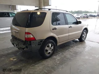 2005 Mercedes-Benz M-Class 3.7L with VIN 4JGAB57E05A553208, listed as a IAAI auction lot 41622243 with 90,904 mi miles. Bid and sale history available at carsss.com. Image 4.