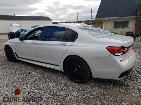 2017 BMW 7 Series 740e xDrive iPerformance with VIN WBA7J2C36HG497830, listed as a Copart auction lot 79948304 with 43,029 mi miles and Salvage Title. Bid and sale history available at carsss.com. Image 2.