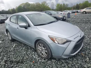 2018 Toyota Yaris with VIN 3MYDLBYV2JY329621, listed as a Copart auction lot 52351815 with 127,195 mi miles and Salvage Title. Bid and sale history available at DreamBid. Image 4.