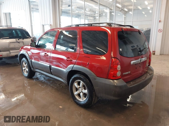 2006 Mazda Tribute S with VIN 4F2YZ06196KM14531, listed as a IAAI auction lot 41594920 with 297,204 mi miles and . Bid and sale history available at carsss.com. Image 3.