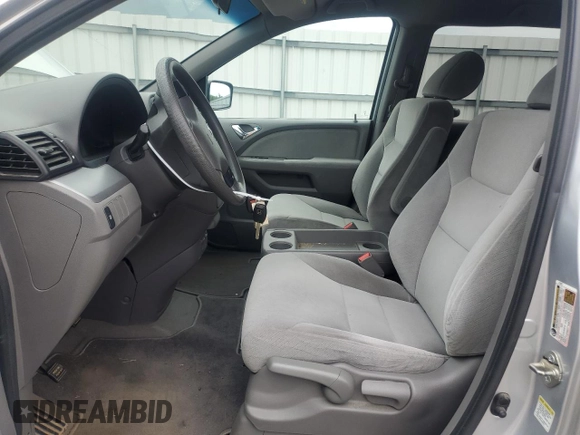 2010 Honda Odyssey LX z VIN 5FNRL3H29AB016853, wystawiony jako Copart lot #56602085 z przebiegiem 154 518 mil mil oraz Szkoda całkowita • Salvage title. Historia ofert i sprzedaży dostępna na DreamBid. Obrazek 7.
