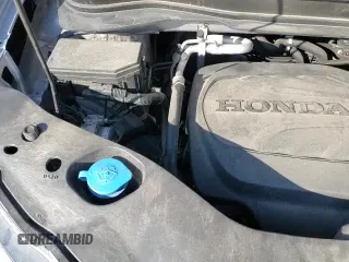 2018 Honda Pilot Touring z VIN 5FNYF6H99JB025070, wystawiony jako Copart lot #64745825 z przebiegiem 81 461 mil mil oraz Szkoda całkowita • Salvage title. Historia ofert i sprzedaży dostępna na DreamBid. Obrazek 16.