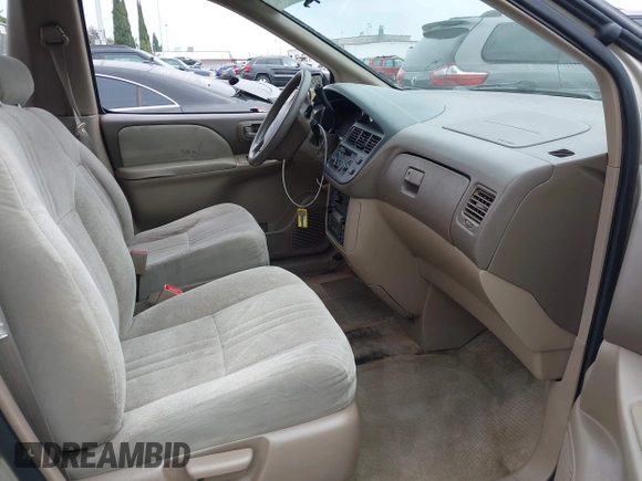 2000 Toyota Sienna CE z VIN 4T3GF19C0YU240639, wystawiony jako IAAI lot #42472106 z przebiegiem 142 456 mil mil oraz . Historia ofert i sprzedaży dostępna na DreamBid. Obrazek 5.