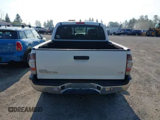2015 Toyota Tacoma with VIN 3TMLU4EN5FM182720, listed as a IAAI auction lot 42555728 with 183,081 mi miles and . Bid and sale history available at DreamBid. Image 16.