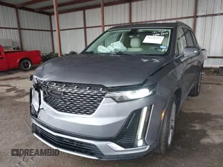 2022 Cadillac XT6 Premium Luxury z VIN 1GYKPDRS1NZ108012, wystawiony jako IAAI lot #41178333 z przebiegiem 83 987 mil mil oraz . Historia ofert i sprzedaży dostępna na DreamBid. Obrazek 17.