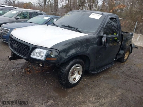 1998 Ford F-150 Standard with VIN 1FTZF1727WNC34697, listed as a IAAI auction lot 41512105 with 140,577 mi miles. Bid and sale history available at carsss.com. Image 2.