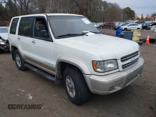2002 Isuzu Trooper S z VIN JACDJ58X227J02390, wystawiony jako IAAI lot #41125455 z przebiegiem 177 350 mil mil oraz . Historia ofert i sprzedaży dostępna na DreamBid. Obrazek 1.