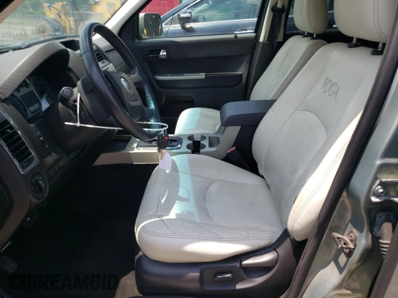 2008 Mercury Mariner Premier with VIN 4M2CU97178KJ45308, listed as a Copart auction lot 64947075 with 140,403 mi miles and Salvage title. Bid and sale history available at DreamBid. Image 7.