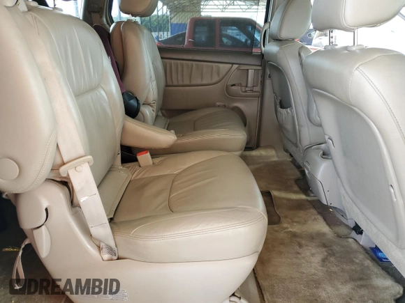 2010 Toyota Sienna XLE with VIN 5TDYK4CCXAS335064, listed as a Copart auction lot 62649665 with 246,327 mi miles and Salvage title. Bid and sale history available at DreamBid. Image 11.