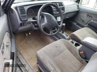 2000 Nissan Frontier XE z VIN 1N6ED27T2YC311037, wystawiony jako Copart lot #57901285 z przebiegiem Nie podano mil oraz Szkoda całkowita • Salvage title. Historia ofert i sprzedaży dostępna na DreamBid. Obrazek 8.