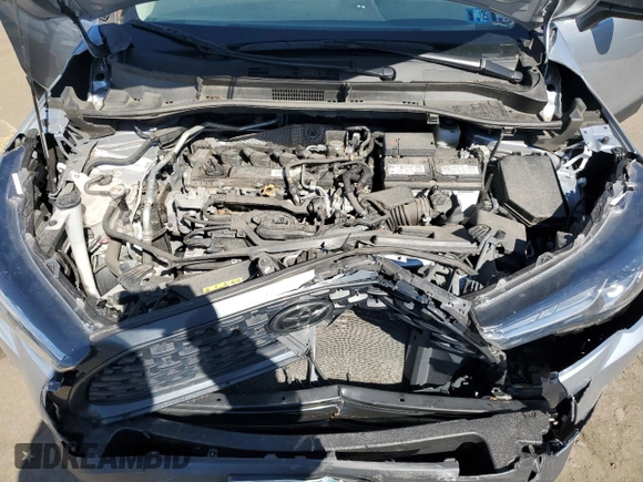 2022 Toyota Corolla Cross L with VIN 7MUAAABG0NV011057, listed as a Copart auction lot 50907545 with 59,328 mi miles and Salvage title. Bid and sale history available at DreamBid. Image 14.