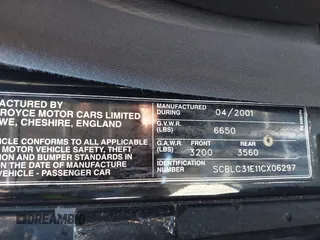 2001 Bentley Arnage with VIN SCBLC31E11CX06297, listed as a IAAI auction lot 41980275 with 63,510 mi miles and . Bid and sale history available at DreamBid. Image 9.