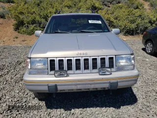 1994 Jeep Grand Cherokee Limited with VIN 1J4GZ78Y0RC190766, listed as a Copart auction lot 54628055 with 217,270 mi miles and Salvage title. Bid and sale history available at DreamBid. Image 5.