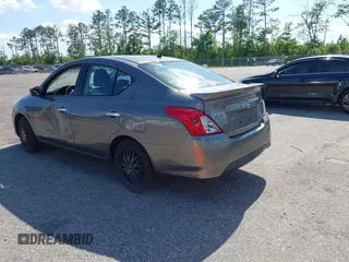 2016 Nissan Versa S Plus with VIN 3N1CN7AP1GL823488, listed as a IAAI auction lot 42060937 with 125,077 mi miles. Bid and sale history available at carsss.com. Image 3.