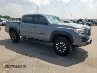 2019 Toyota Tacoma SR z VIN 5TFCZ5AN6KX211952, wystawiony jako Copart lot #58964815 z przebiegiem 97 774 mil mil oraz Szkoda całkowita • Salvage title. Historia ofert i sprzedaży dostępna na DreamBid. Obrazek 4.