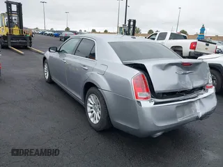 2014 Chrysler 300 with VIN 2C3CCAAG7EH249196, listed as a IAAI auction lot 42180023 with 48,241 mi miles and . Bid and sale history available at DreamBid. Image 3.