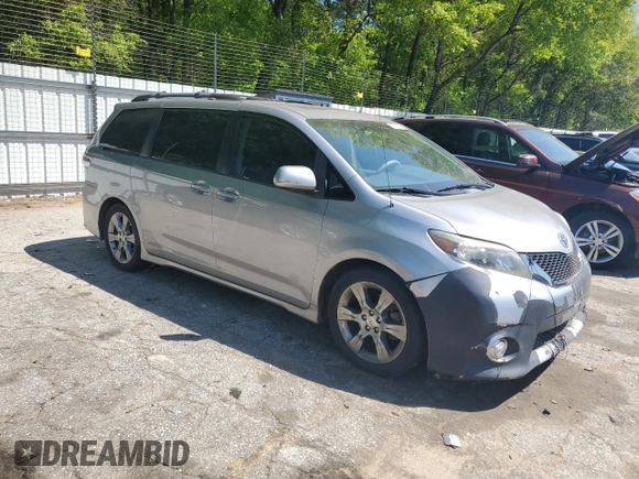 2012 Toyota Sienna SE with VIN 5TDXK3DC7CS239254, listed as a Copart auction lot 53244725 with 134,669 mi miles and Clean Title. Bid and sale history available at carsss.com. Image 4.
