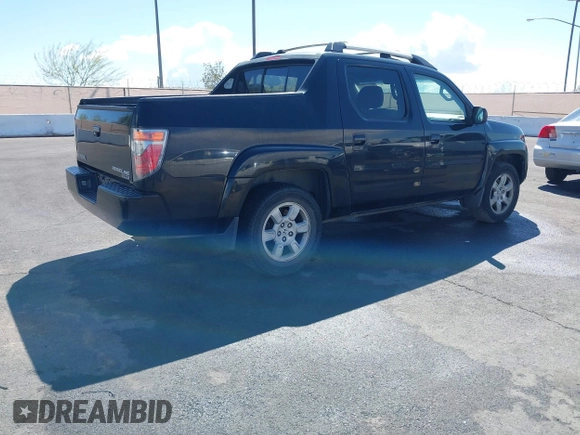 2007 Honda Ridgeline RTL w/Leather with VIN 2HJYK16577H547869, listed as a IAAI auction lot 41939741 with 248,916 mi miles. Bid and sale history available at carsss.com. Image 4.