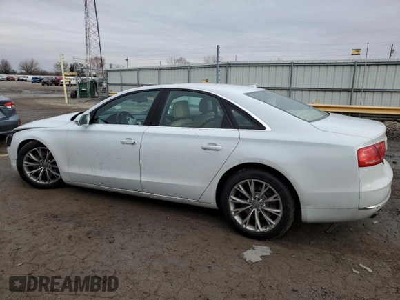 2012 Audi A8 с VIN WAUAVAFD0CN036751, выставлен на аукционе Copart как лот 86383784 с пробегом 96 658 миль миль и Списание • Salvage title. История ставок и продаж доступна на DreamBid. Изображение 2.