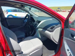 2015 Hyundai Accent GLS with VIN KMHCT4AE6FU817654, listed as a IAAI auction lot 42033692 with 134,335 mi miles and . Bid and sale history available at carsss.com. Image 5.