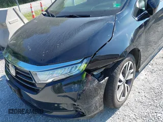 2021 Honda Odyssey Touring with VIN 5FNRL6H84MB027396, listed as a IAAI auction lot 42616650 with 67,207 mi miles and . Bid and sale history available at DreamBid. Image 6.