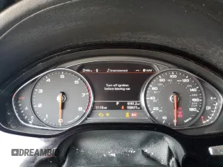 2014 Audi A8 3.0T z VIN WAURGAFD2EN002567, wystawiony jako Copart lot #48188395 z przebiegiem 159 477 mil mil oraz Szkody całkowita. Historia ofert i sprzedaży dostępna na DreamBid. Obrazek 9.